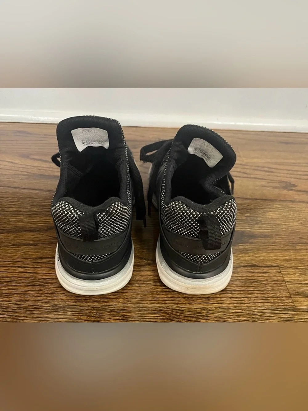 APL Ascends black and silver tennis shoes